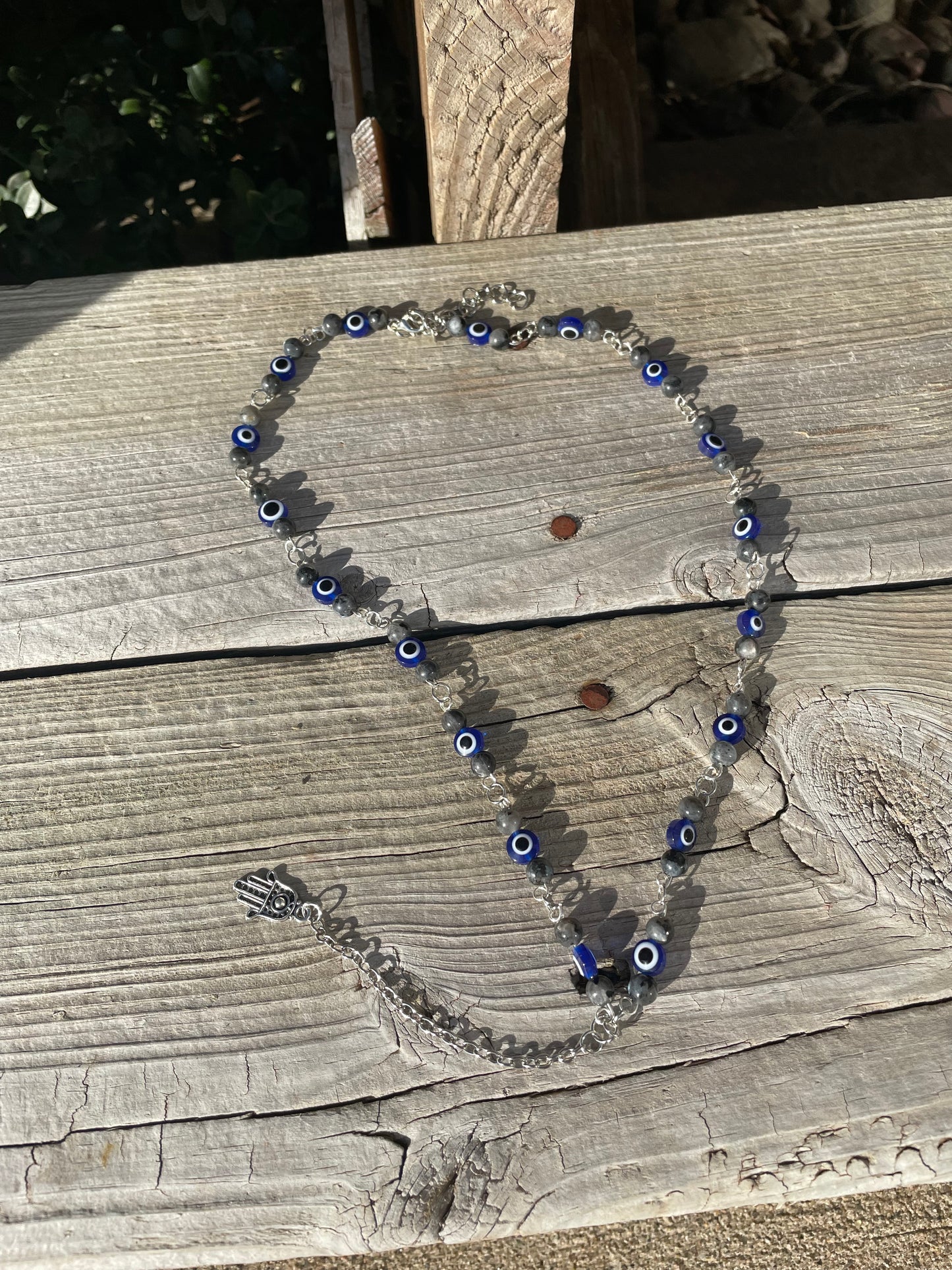 Evil eye and Hamsa Hand Crystal necklace